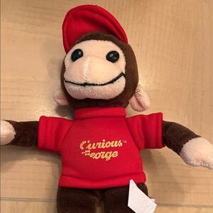 Curious George 9” Plush Monkey Stuff VTG
Preowned brown red shirt yellow name